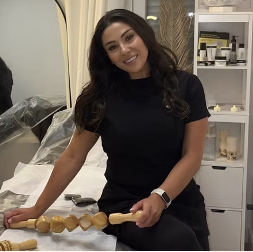 Parissa in her Calm & Contour studio with a contouring tool